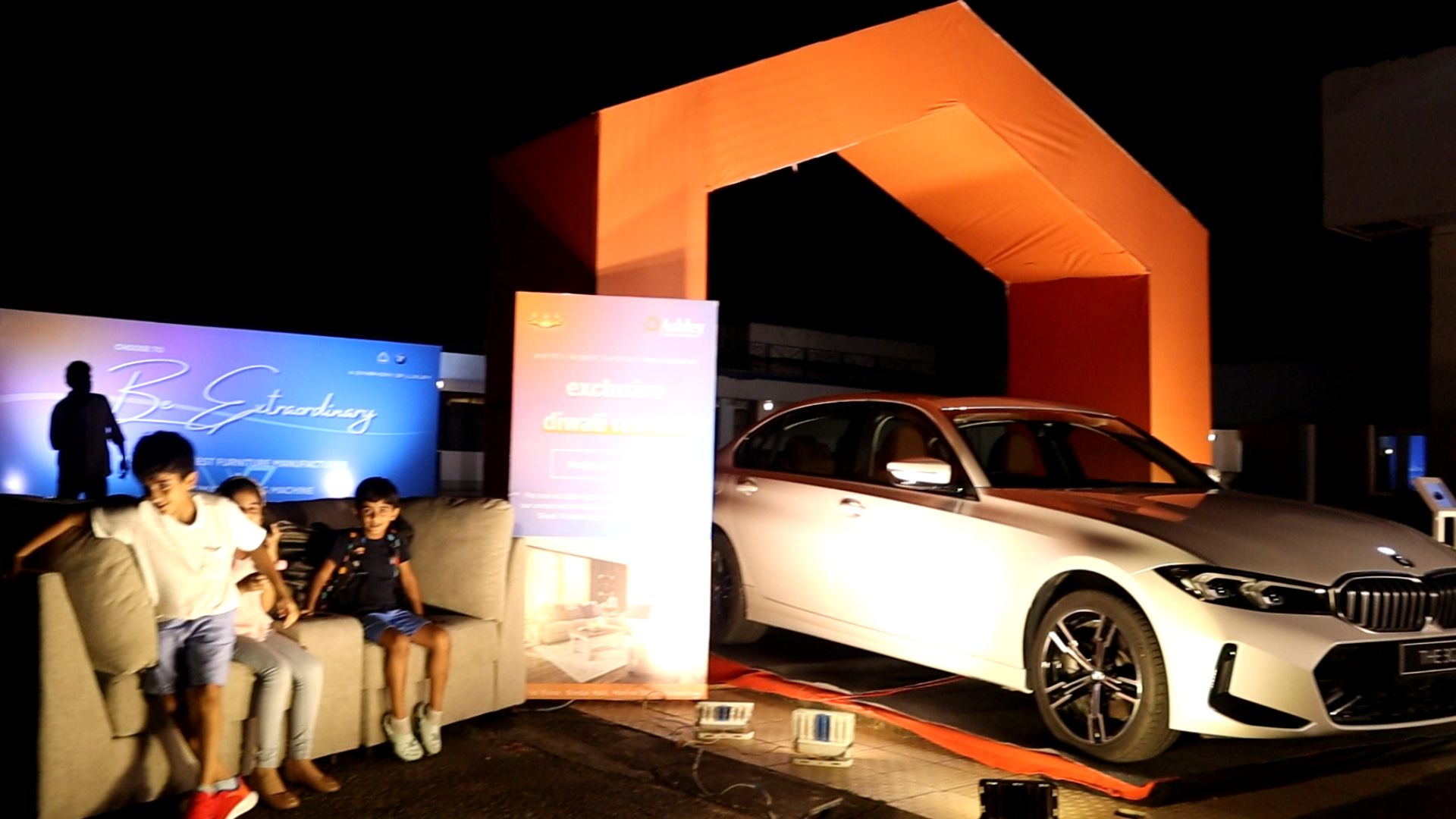 Premium auto activation at night with a white BMW