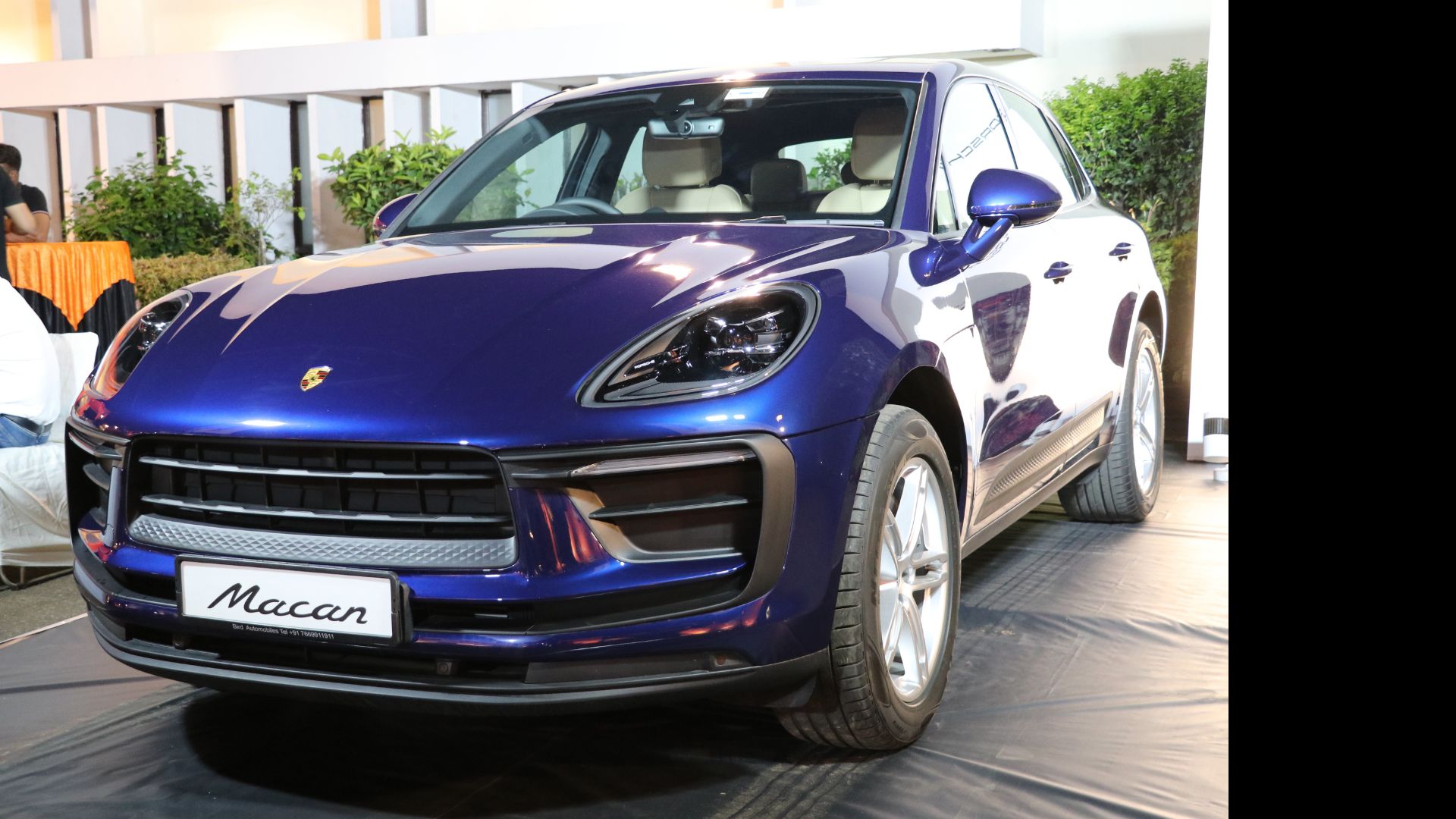 Porsche parked outside a premium activation