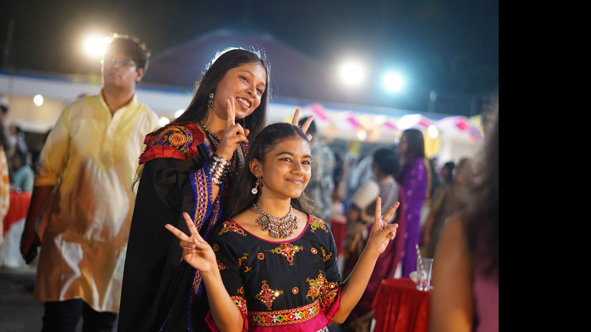 Guests smiling at a live event